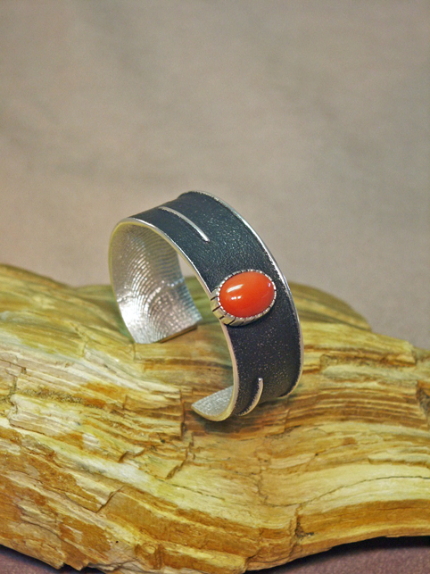 Bracelet: oxidized silver, coral