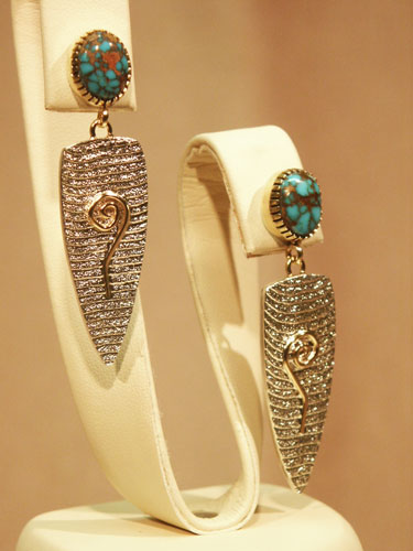 Cuttlebone Cast Sterling with Red Web Candelaria Turquoise 18K bezel and accents, post earrings