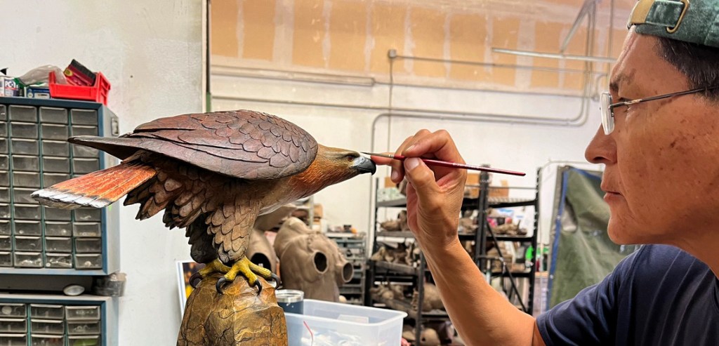 Joe Cajero working on Communion of Spirits - The Red Tail Hawk